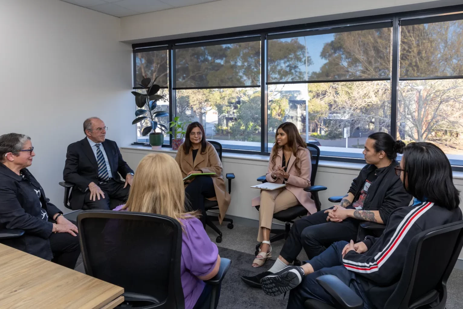 Group of people talking to each other