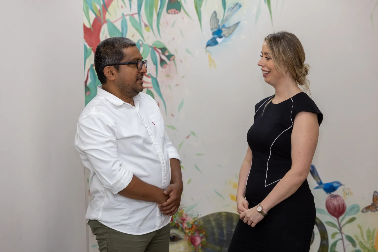 2 adults talking to each other